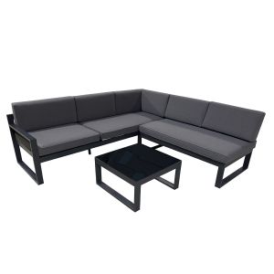Sectionnel pour l'extérieur avec une table avec un dessus en verre, modulable avec des coussins gris.
