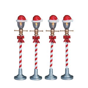 Ensemble de 4 lampadaires avec chapeaux du Père Noël