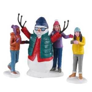 Selfie avec un bonhomme de neige
