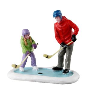 Figurines pratique de hockey père et fille